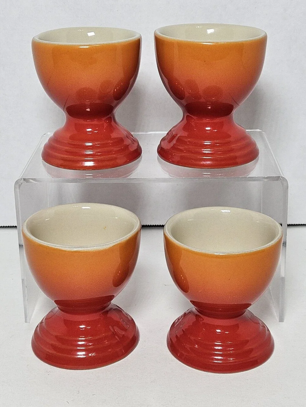 NWT Le Creuset Footed Egg Cups Set of 4 Flame Volcanic Orange Stoneware
